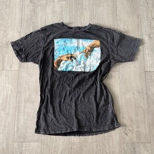 PacSun Black Graphic Tee with Blue Sky and Brown Hands